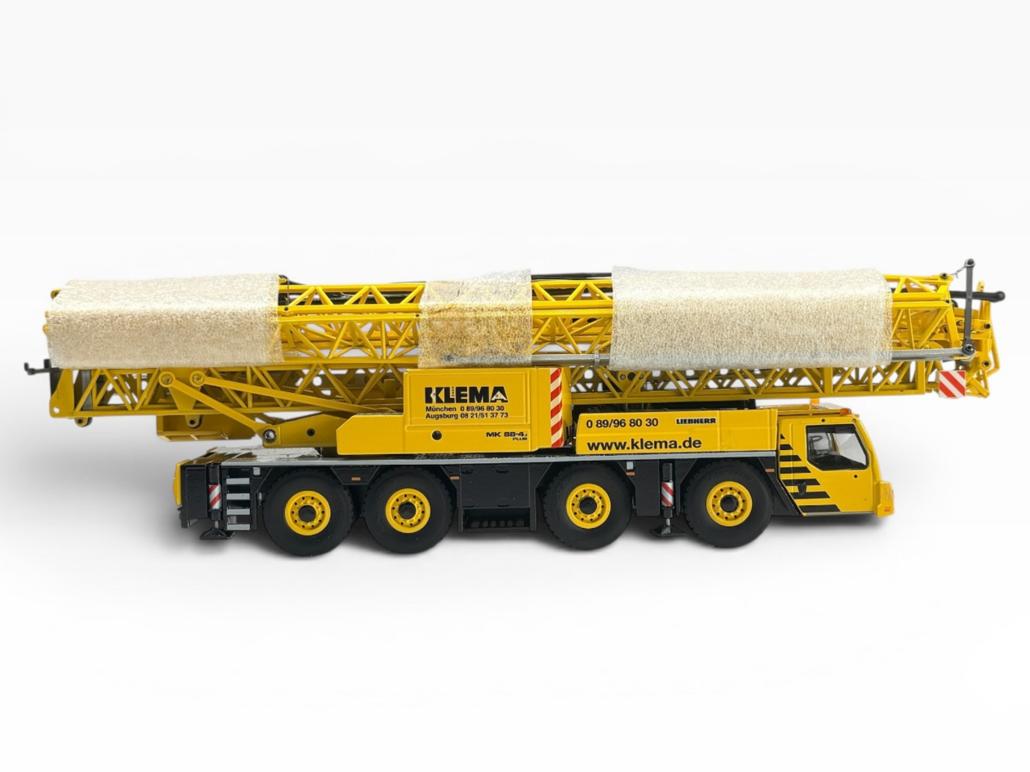 Conrad Liebherr MK 88-4.1 Mobilbaukran in der Werbeausführung KLEMA Kranverleih GmbH München-Oberschleißheim – Diecast Sondermodell im Maßstab 1:50, Zinkdruckguss